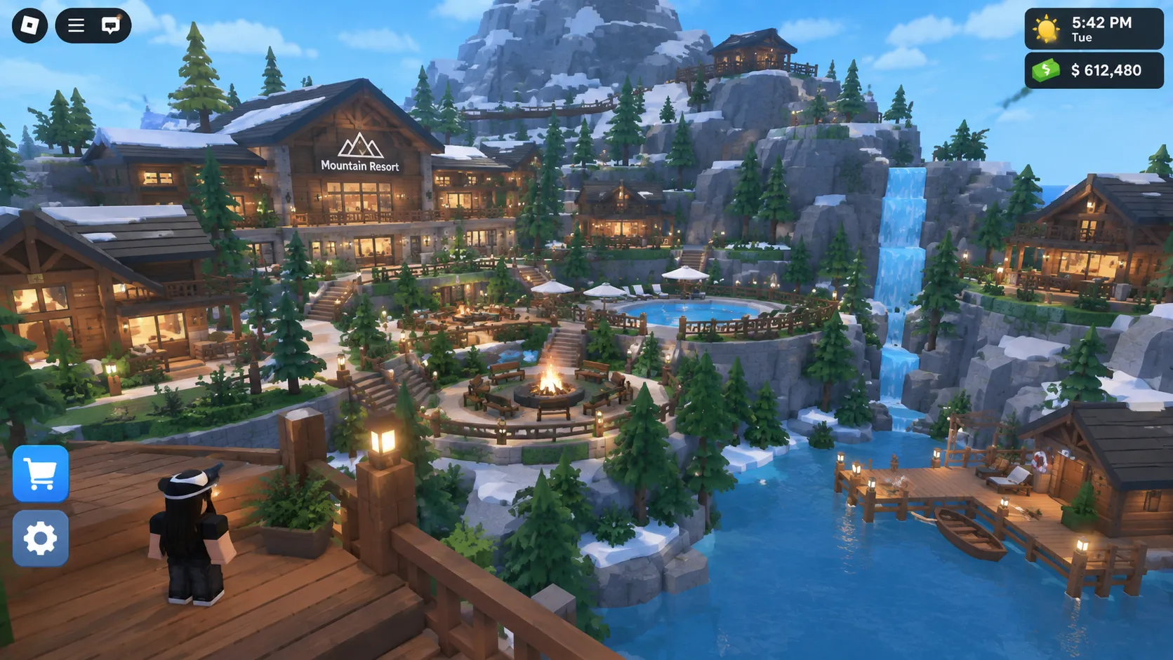 Roblox mountain resort with cabins, pine trees, waterfall and outdoor seating