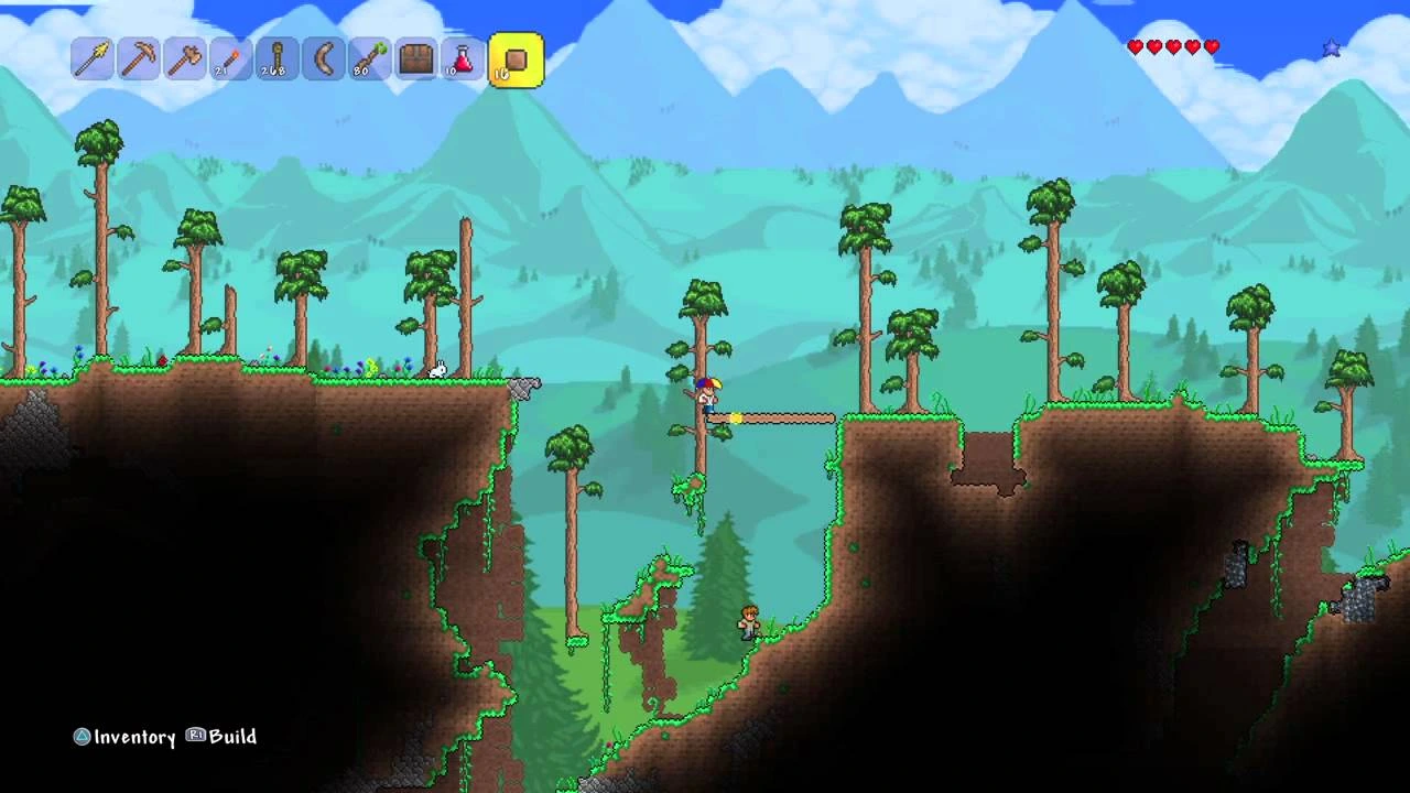 Terraria gameplay showing exploration, building and sandbox gameplay